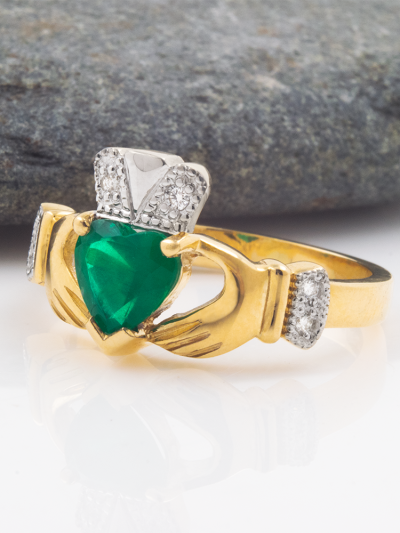 14K Gold Claddagh Ring with emerald heart and brilliant-cut diamonds, symbolizing love, loyalty, and friendship.