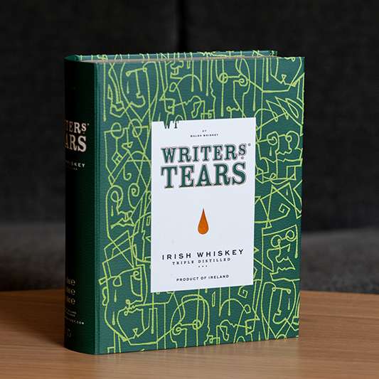 A premium bottle of Writers’ Tears Whiskey, an ideal addition to luxury Irish room drop gifts.