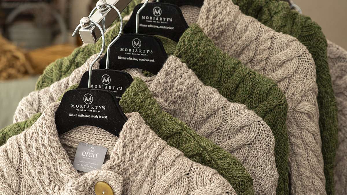 Irish Wool Cardigans – Corporate Gifting Blog Ireland Irish wool cardigans hanging up – Corporate Gifting Blog Ireland banner.